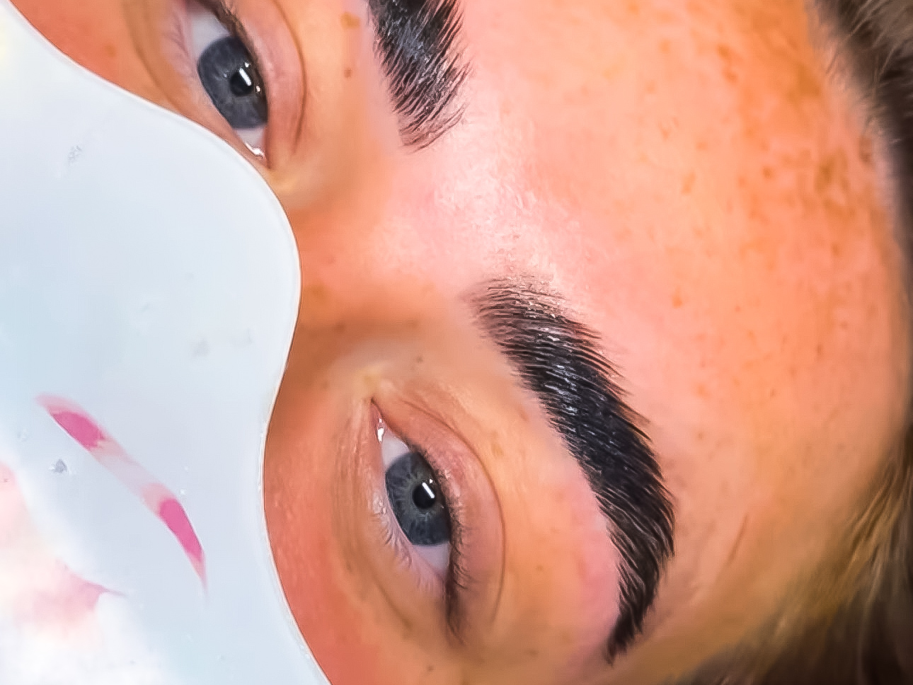 Close-up of a finished brow treatment